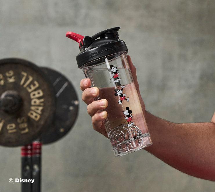pro-series-h5 Mickey_Mouse_Protein_Shaker_Bottle_Being_Held_In_the_Gym.jpg